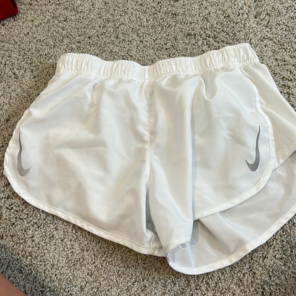 White Nike shorts